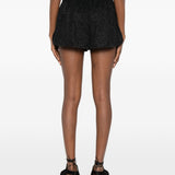 Shorts lamé in nero Oséree - donna 