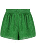 Shorts metallizzati Lumière in verde Oséree - donna