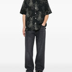 Camicia a maniche corte con fantasia in nero Our legacy - uomo 