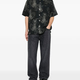Camicia a maniche corte con fantasia in nero Our legacy - uomo 