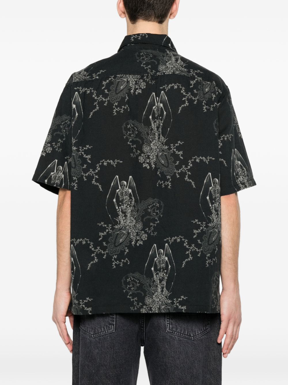 Camicia a maniche corte con fantasia in nero Our legacy - uomo 