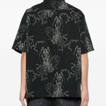 Camicia a maniche corte con fantasia in nero Our legacy - uomo 
