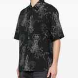 Camicia a maniche corte con fantasia in nero Our legacy - uomo 
