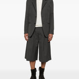 Pantaloncini gessati con spacchi in grigio Our legacy - uomo 