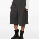 Pantaloncini gessati con spacchi in grigio Our legacy - uomo 