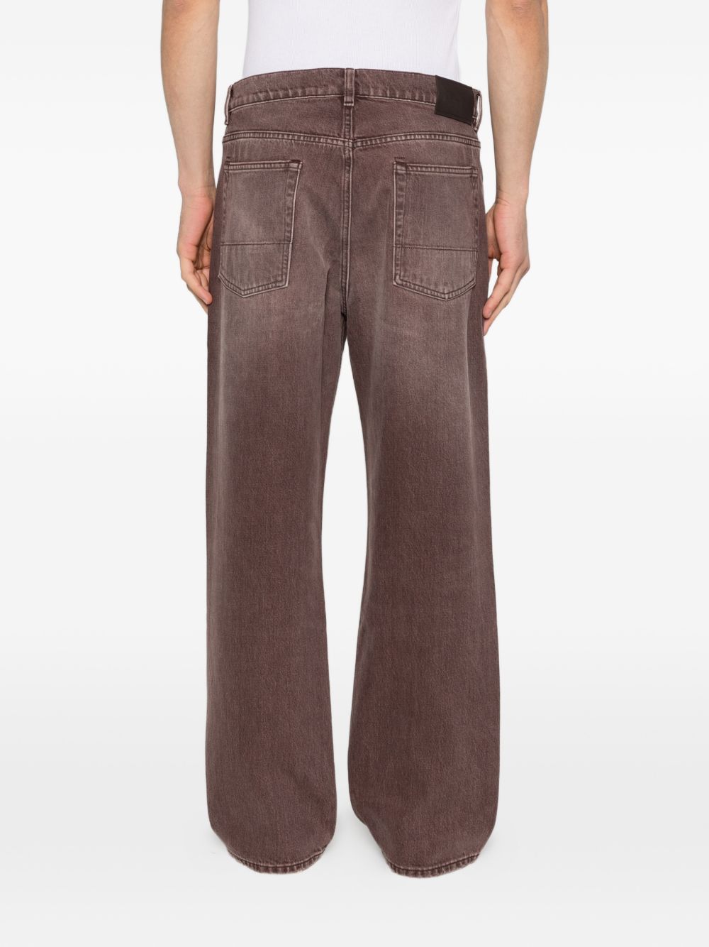 Jeans con effetto schiarito in marrone Our legacy - uomo 