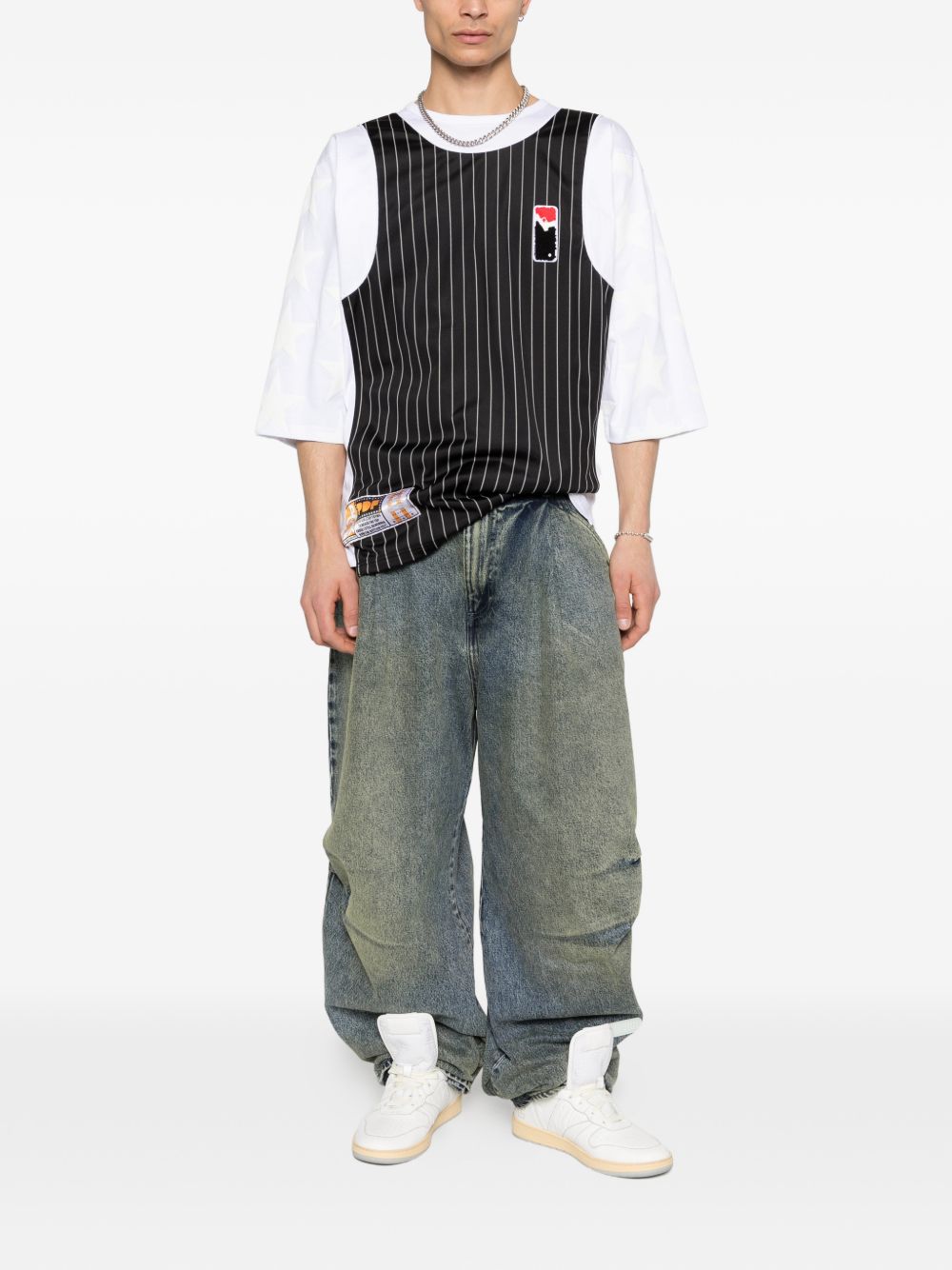Jeans con pieghe in blu Pdf - uomo 