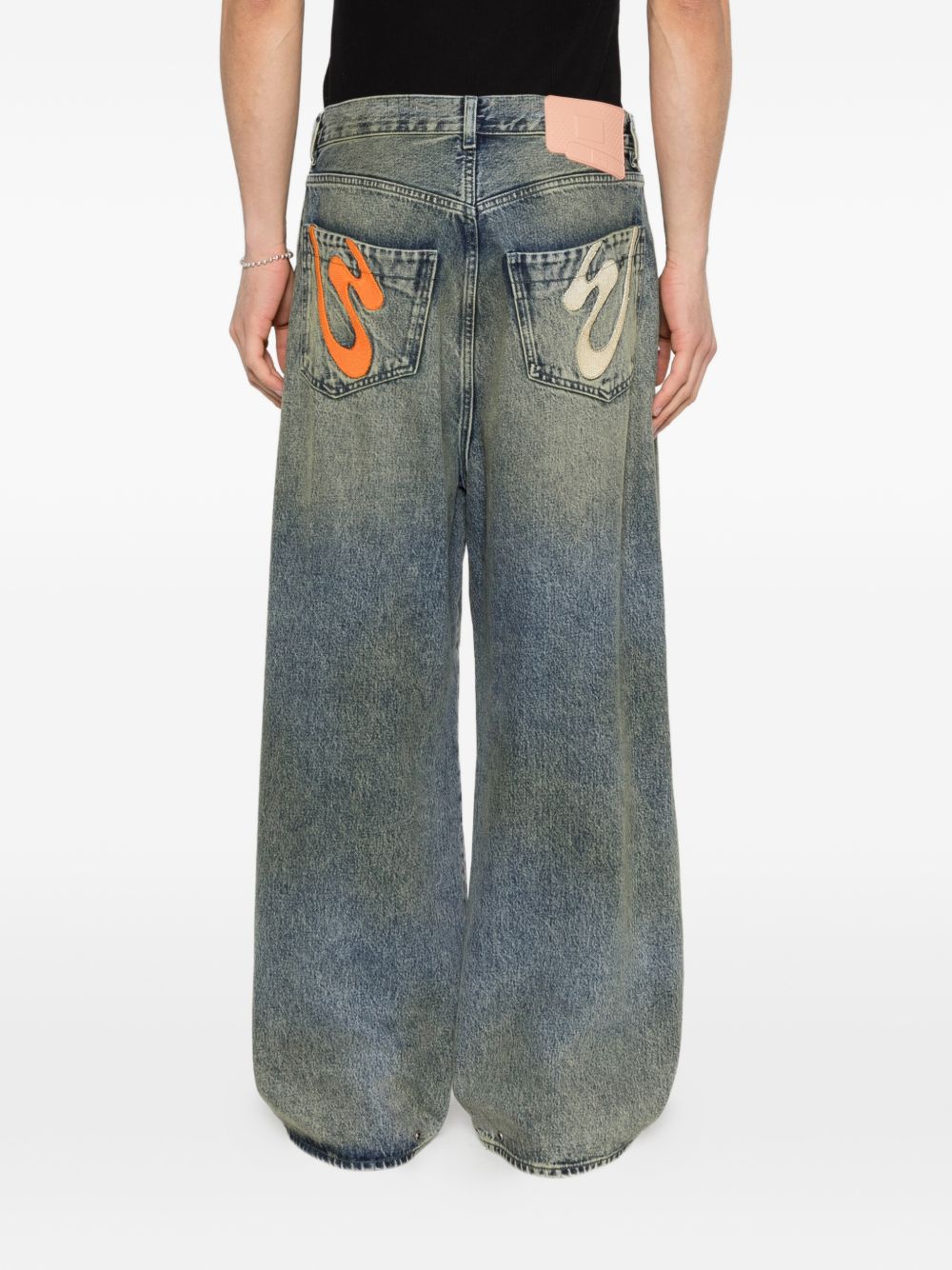Jeans con pieghe in blu Pdf - uomo 