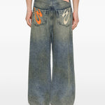 Jeans con pieghe in blu Pdf - uomo 