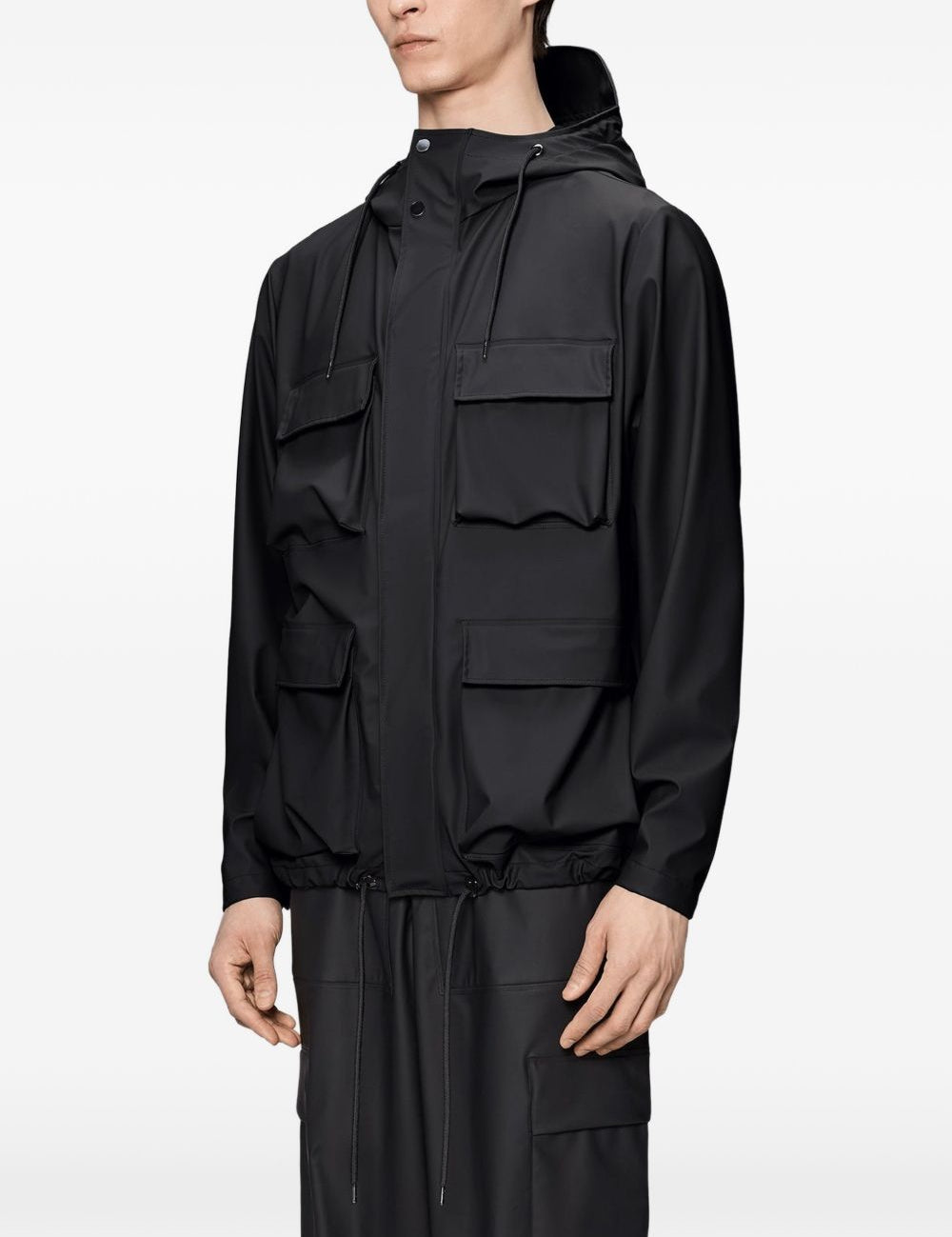 Giacca con cappuccio in nero Rains - unisex 