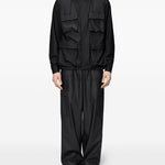 Giacca con cappuccio in nero Rains - unisex 