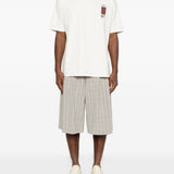 T-shirt con logo grafico in bianco Rhude - uomo 