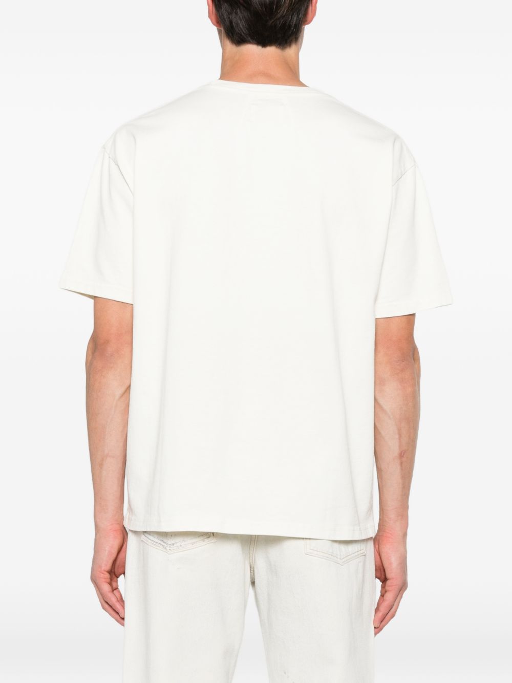 T-shirt con stampa grafica in bianco Rhude  - uomo 
