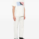 T-shirt con stampa grafica in bianco Rhude  - uomo 