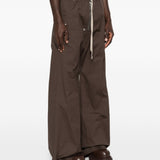 Pantaloni con dettaglio zip in grigio Rick owens - uomo 