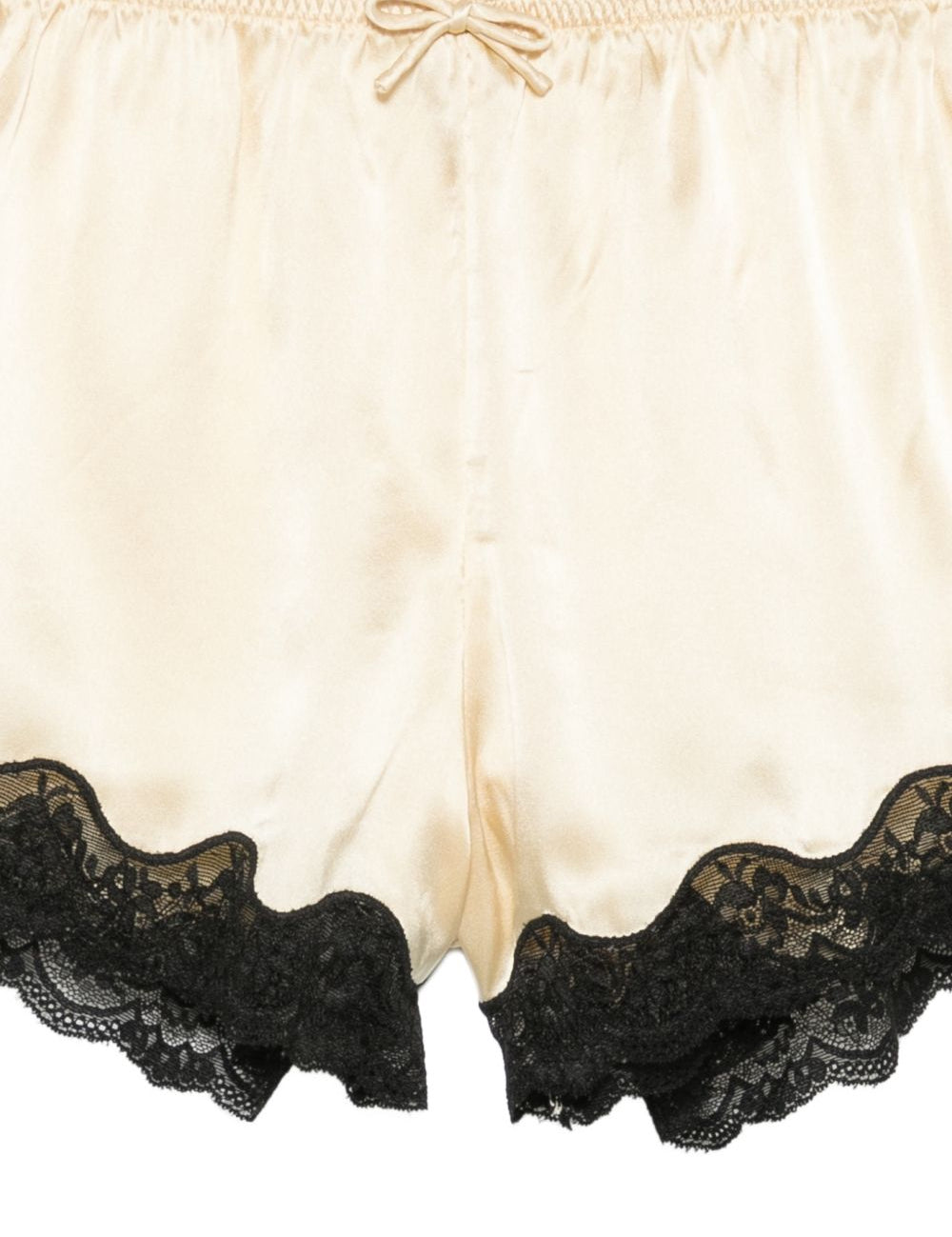 Pantaloncini con bordo in pizzo e fiocco decorativo in beige Rotate x love stories - donna 