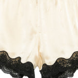Pantaloncini con bordo in pizzo e fiocco decorativo in beige Rotate x love stories - donna 