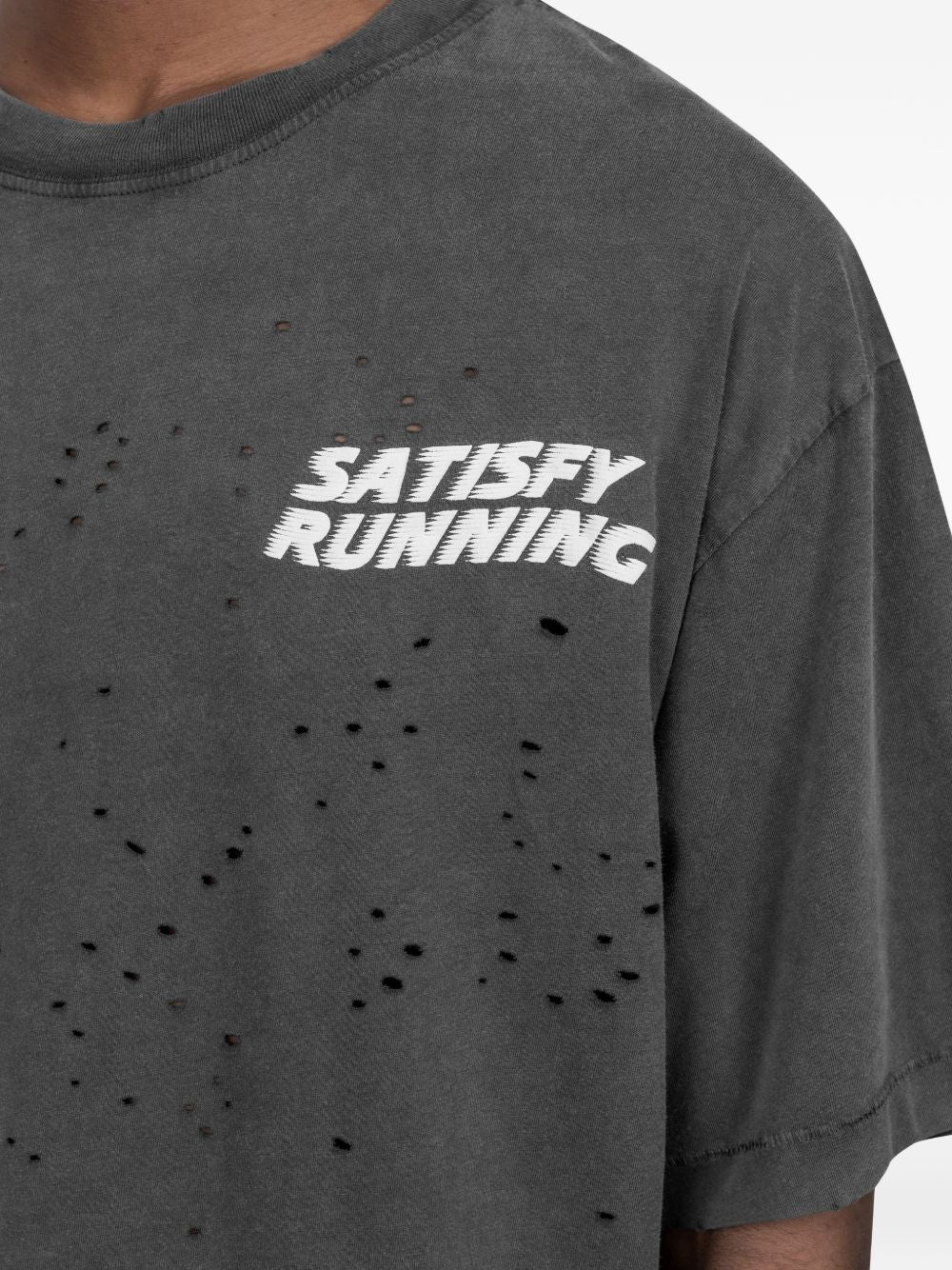T-shirt con effetto vissuto in nero Satisfy - unisex 