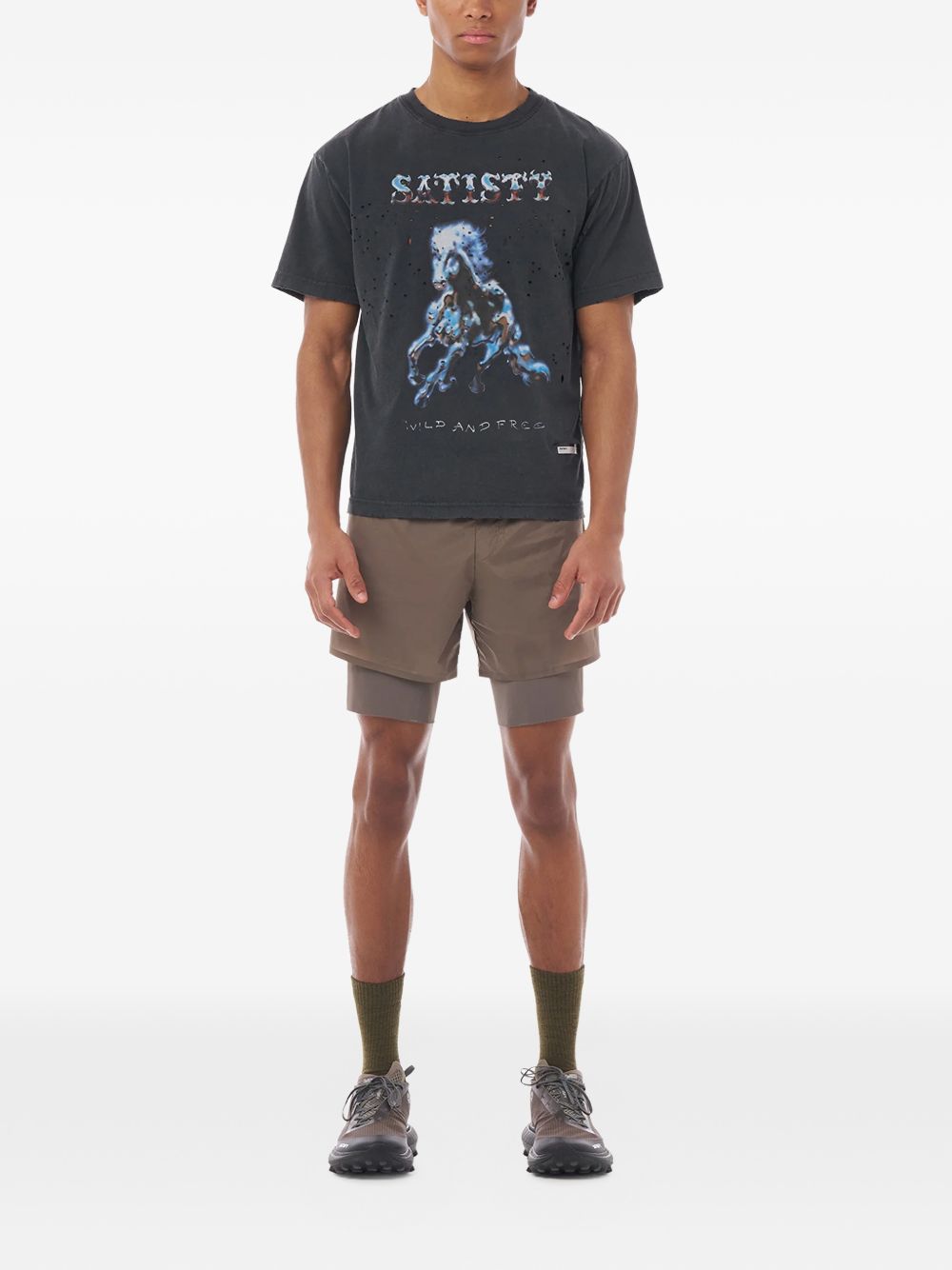 T-shirt con effetto vissuto in nero Satisfy - unisex 