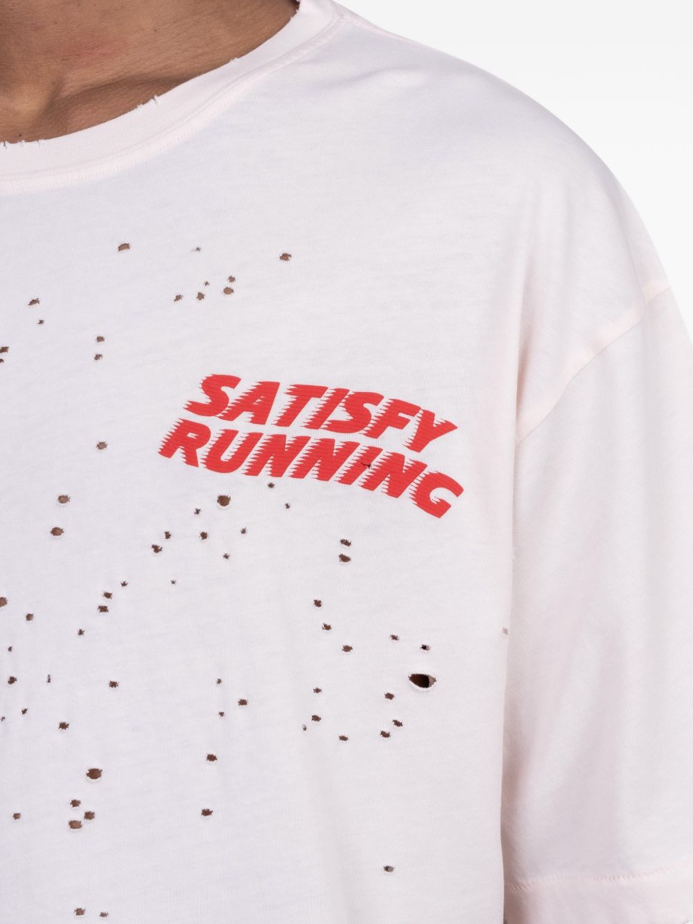 T-shirt con effetto vissuto in bianco Satisfy - unisex 