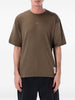 T-shirt AuraLite™ plissettata in verde Satisfy - unisex