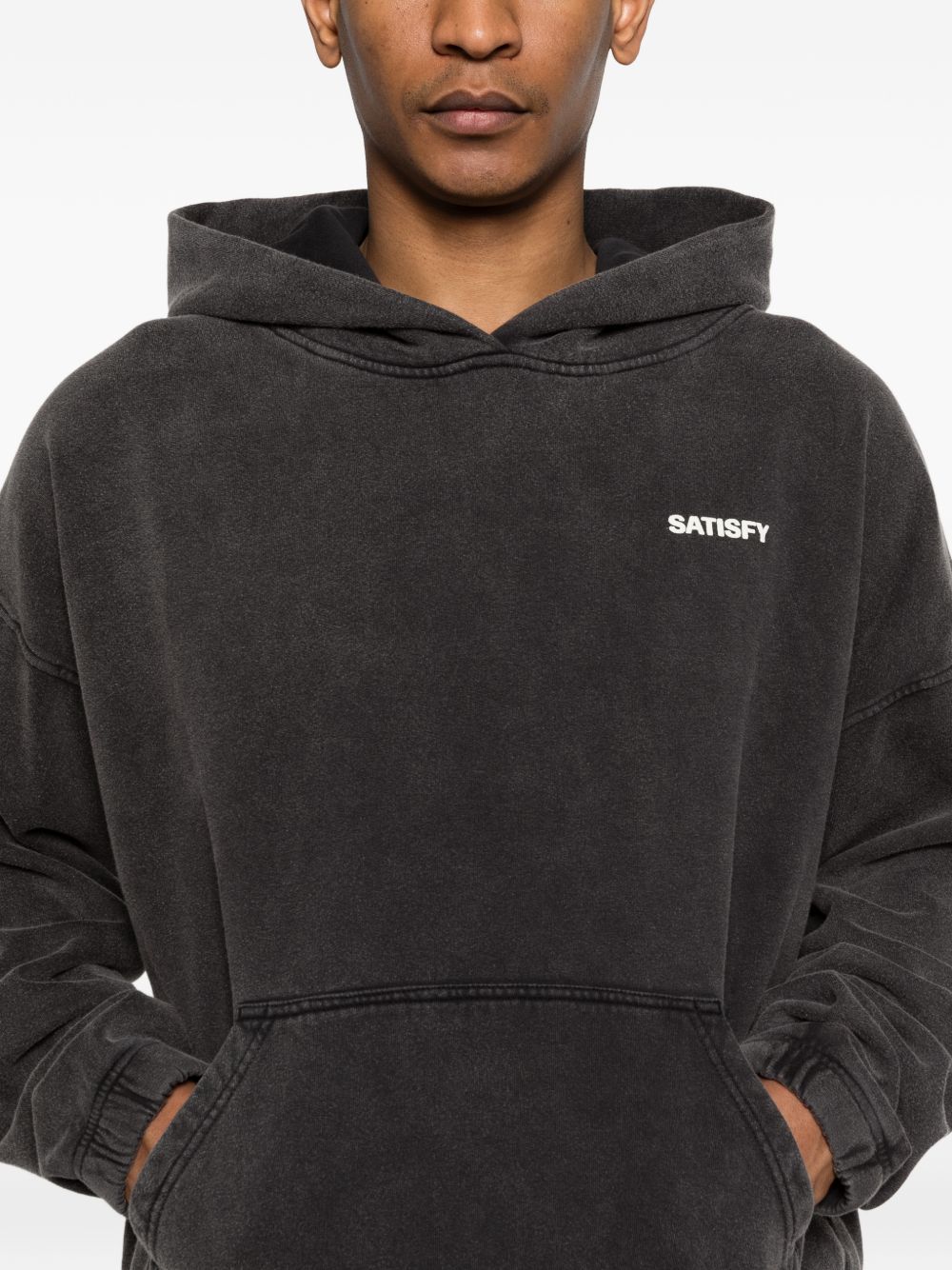 Felpa con cappuccio in nero Satisfy - unisex 