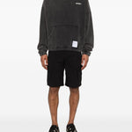 Felpa con cappuccio in nero Satisfy - unisex 