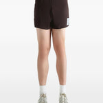 Pantaloncini con coulisse in marrone Satisfy - unisex 