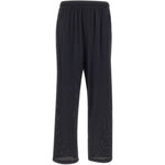 Pantaloni da tuta Space-O traforati in nero Satisfy - unisex 