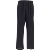Pantaloni da tuta Space-O traforati in nero Satisfy - unisex 