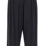 Pantaloni da tuta Space-O traforati in nero Satisfy - unisex 