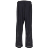 Pantaloni da tuta Space-O traforati in nero Satisfy - unisex 
