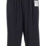 Pantaloni da tuta Space-O traforati in nero Satisfy - unisex 