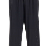 Pantaloni da tuta Space-O traforati in nero Satisfy - unisex 