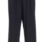 Pantaloni da tuta Space-O traforati in nero Satisfy - unisex 