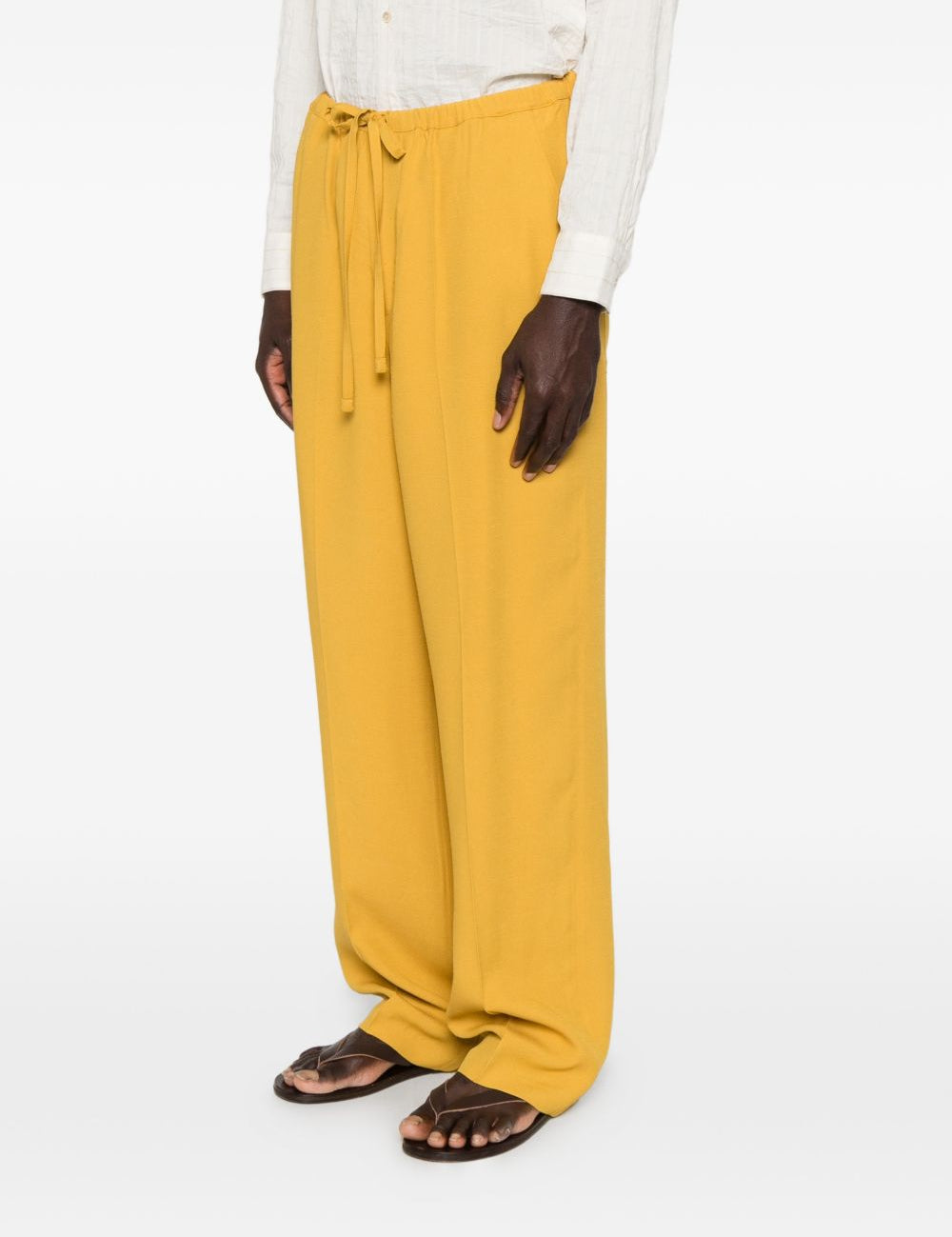 Pantaloni con coulisse in vita e piega stirata in giallo Second layer - uomo 