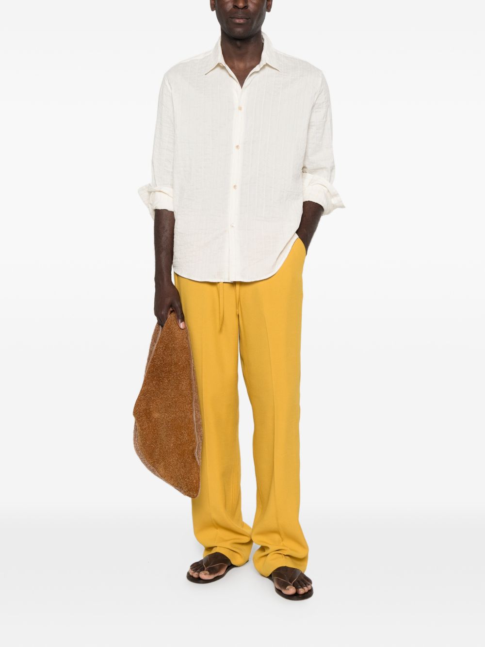 Pantaloni con coulisse in vita e piega stirata in giallo Second layer - uomo 