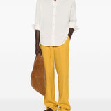 Pantaloni con coulisse in vita e piega stirata in giallo Second layer - uomo 