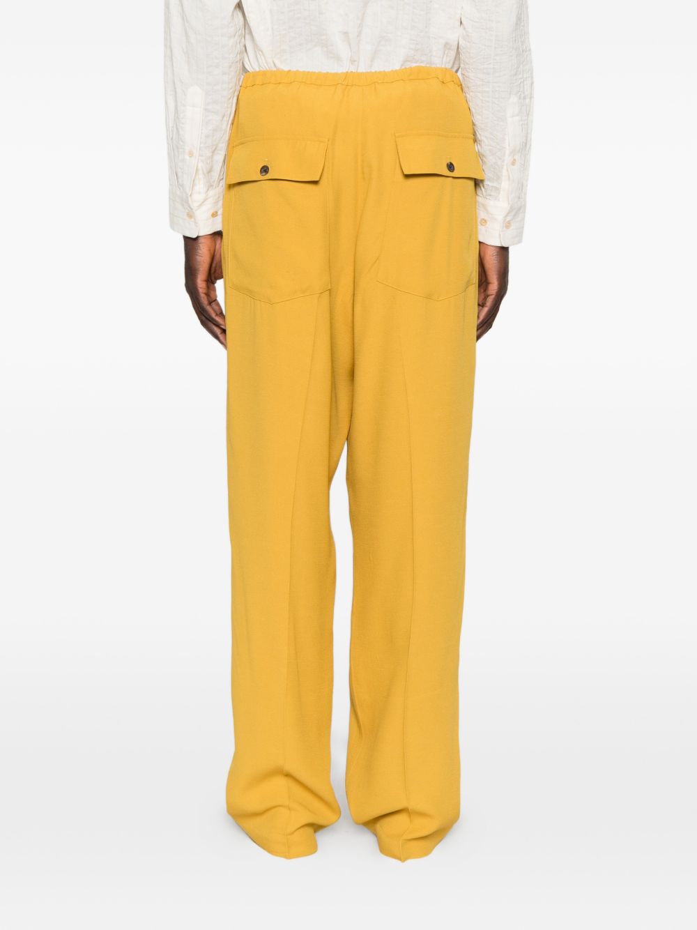 Pantaloni con coulisse in vita e piega stirata in giallo Second layer - uomo 