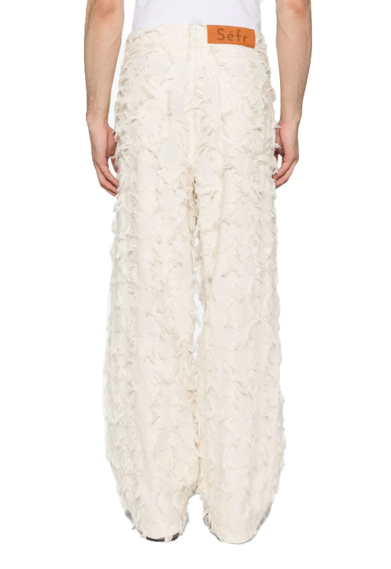 Jeans nikos con frange in bianco 