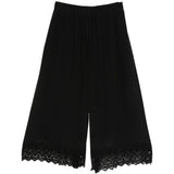 Pantaloni corti con orlo in pizzo in nero simone rocha - donna 