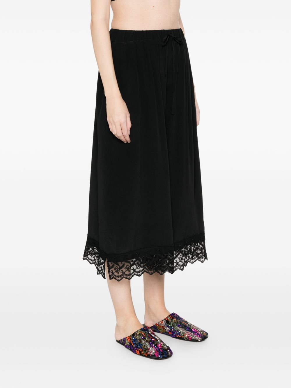 Pantaloni corti con orlo in pizzo in nero simone rocha - donna 