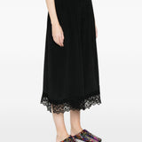 Pantaloni corti con orlo in pizzo in nero simone rocha - donna 