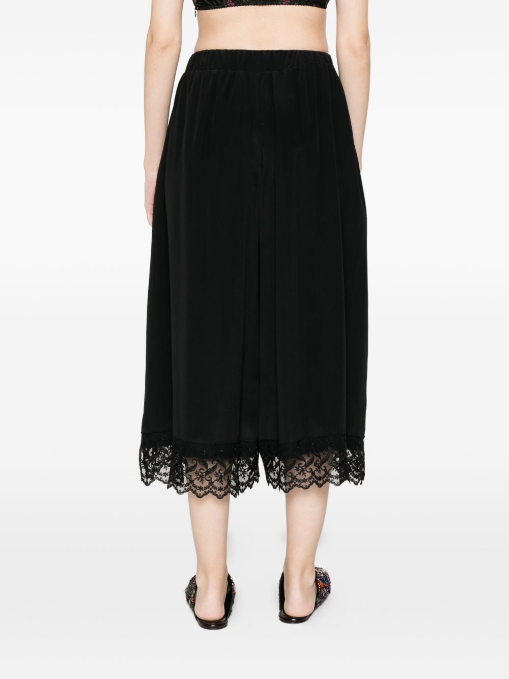 Pantaloni corti con orlo in pizzo in nero simone rocha - donna 