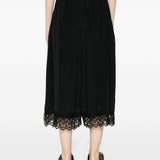 Pantaloni corti con orlo in pizzo in nero simone rocha - donna 
