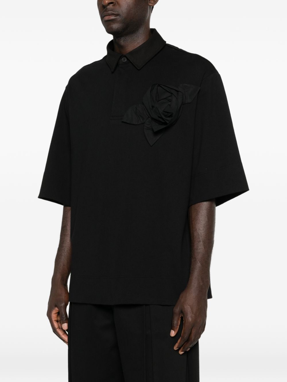 Polo con applicazioni di fiori in nero Simone rocha - uomo 