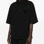 Polo con applicazioni di fiori in nero Simone rocha - uomo 