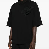 Polo con applicazioni di fiori in nero Simone rocha - uomo 