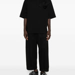 Polo con applicazioni di fiori in nero Simone rocha - uomo 