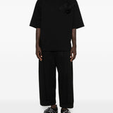 Polo con applicazioni di fiori in nero Simone rocha - uomo 